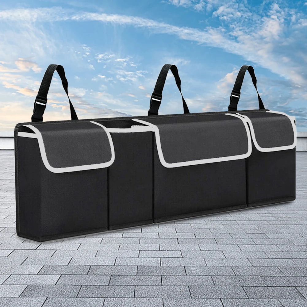 https://ae01.alicdn.com/kf/S5c19b3e7ee934a9395ad3ecd707f925a9/Car-Trunk-Box-with-4-Pockets-Storage-Box-Case-Large-Capacity-Hanging-Back-Seat-Storage-Bag.jpg